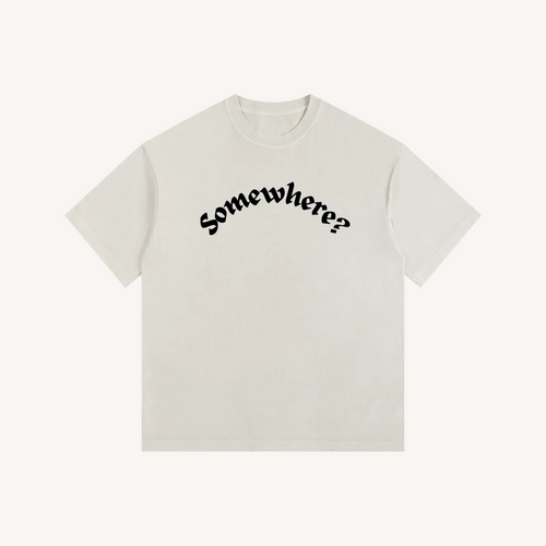 Beige t-shirt with black text 'Somewhere?' on a white background