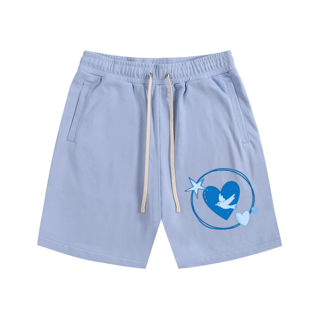 Light blue shorts with a heart and dove design on a white background