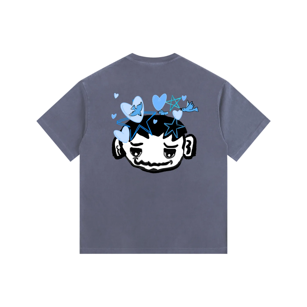 Gray t-shirt with a graphic design on the back featuring a face with stars and hearts.
