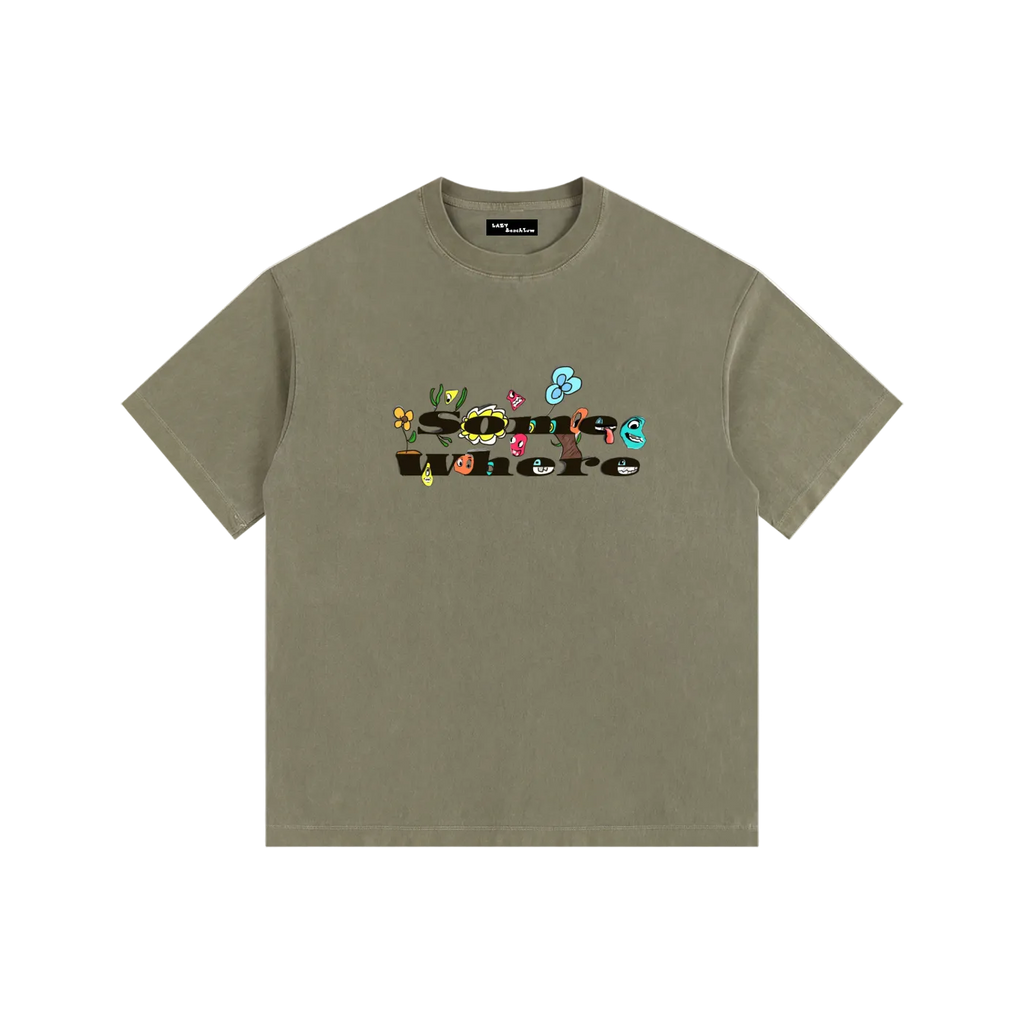 Green t-shirt with colorful graphic design on a white background