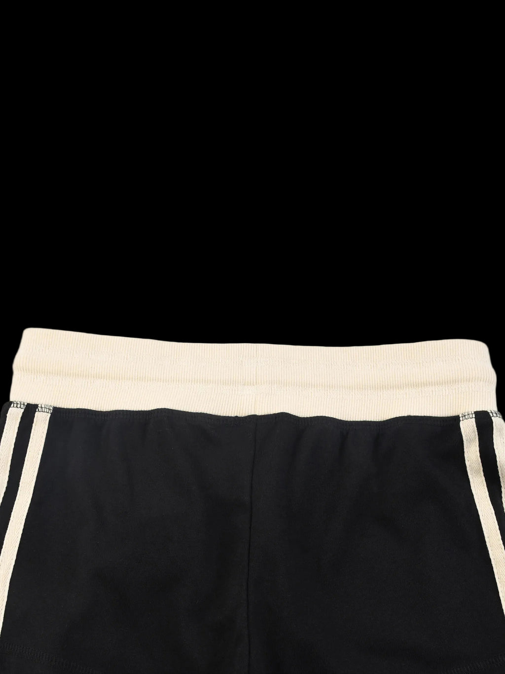 Black shorts with a cream waistband on a white background