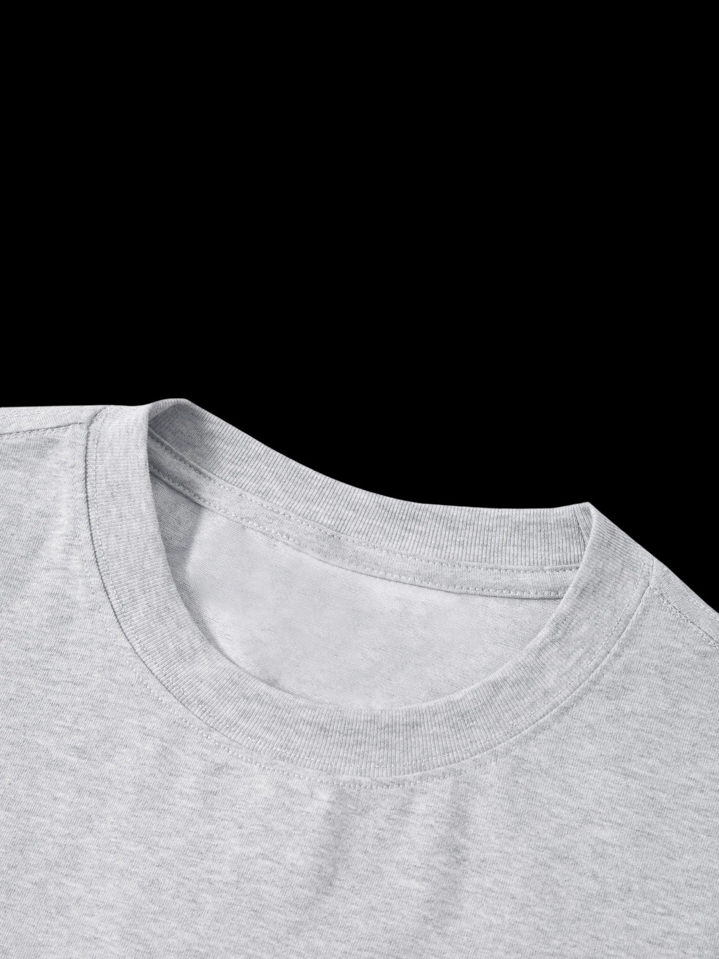 Close-up of a gray t-shirt collar on a white background