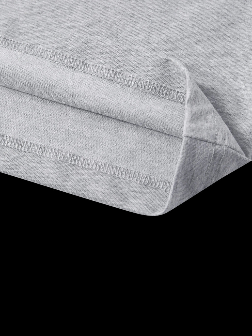 Gray fabric with a subtle pattern on a white background
